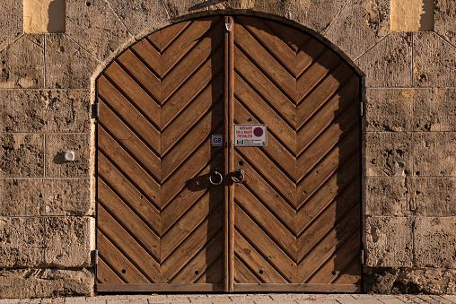 Garmisch-Partenkirchen, Germany - December 20,2021: Old Main Entrance Wooden Door.