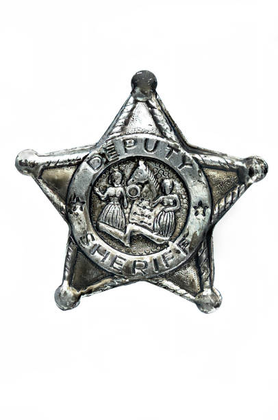 istock Old sheriff badge isolated on a white background 1917289628