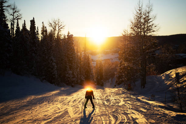 Skiing at sunset in Colorado USA