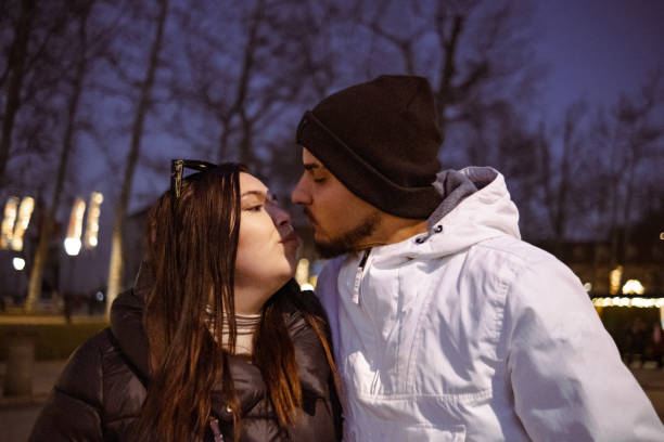 istock Lovely couple taking a walk at night 1917340209