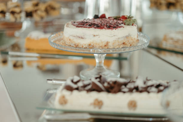 istock several layered cakes on glass platters are in various sizes 1917346643