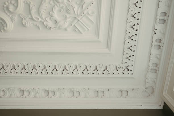 istock this is an ornate ceiling with white paint and a clock 1917347767