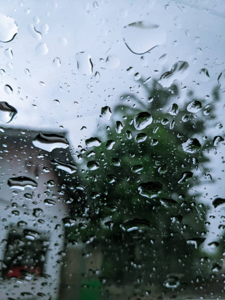 istock Rain water on the car window 1917355813