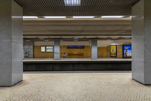 Lisbon, Portugal. 8 December 2023. Empty Metro station in Lisbon, the blue line. Name of the subway station is Restauradores. With empty bench.