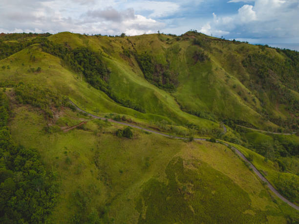 istock Green Grass Hill in West Seram Regency, Maluku 1917456033