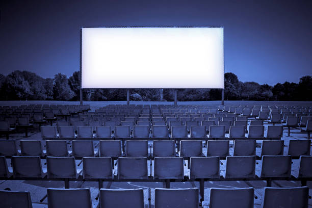 istock Outdoor cinema with white projection screen - toned image with copy space 1917458733