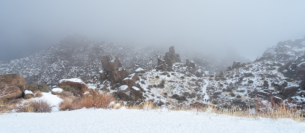 Winter storm brings snow and fog to the boulders of the McDowell Mountains