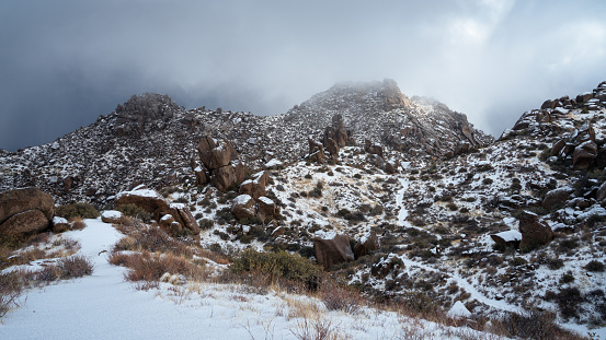 Winter storm brings snow and fog to the boulders of the McDowell Mountains