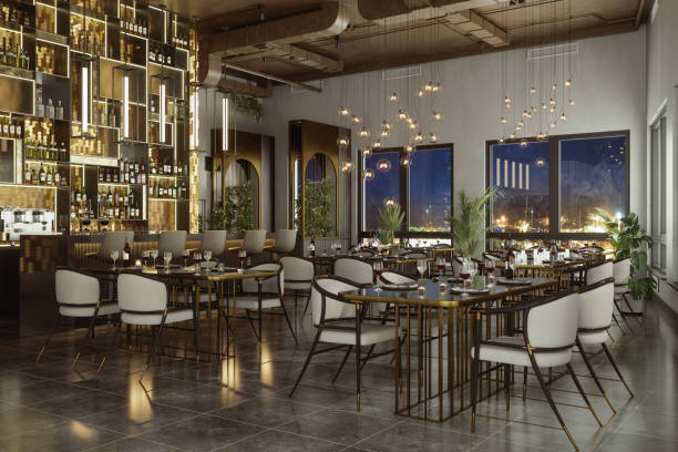 istock Luxury Restaurant Interior At Night With Dining Tables, Potted Plants, Pendant Lights And Cityscape Through The Window 1917539042