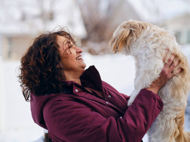 A mature aged hispanic woman, outdoors in winter in Utah USA.