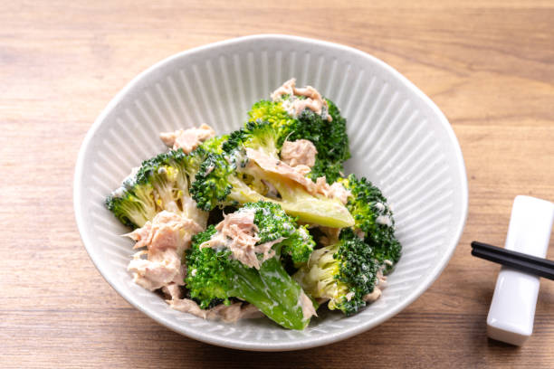 Broccoli with tuna and mayo stock photo
