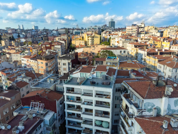 close-up view of houses with bright roofs of residential buildings, buildings in the european part of the city in istanbul on a sunny day, drone view . - mosque europe part of day ストックフォトと画像
