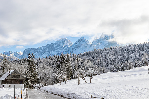 Landscape photo of mountain peaks of Julian Alps, winter time in Tarvisio, Italy