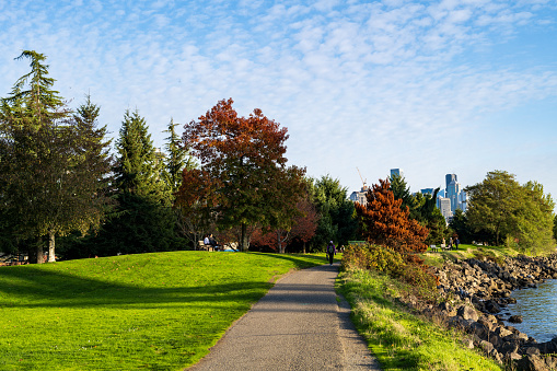 Seattle WA, USA - October 23, 2023:  People enjoy outdoor activities along Seattle Waterfront.