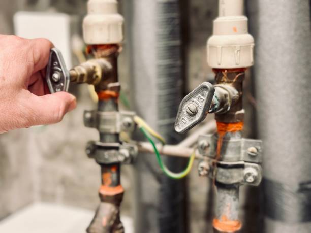 istock Shutting off the valve in the water supply pipe. 1917602394