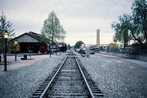 Grainy film photograph of railroad tracks at Old Sacramento State Historic Park in central California.  Shot on slide film in April 1987.