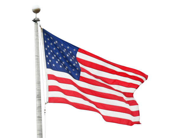 istock waving USA flag on pole isolated on white background 1917633428
