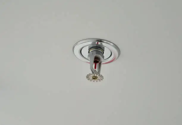 fire sprinkler or sprinkler head is component of a fire sprinkler system that discharge water when effect of fire have been detected, such as when a predetermined temperature exceeded, head sprinkler, ventilation, examination, explosion, nozzle, spray, water, plasterboard, soffit, ventilated, gray, dark, red,