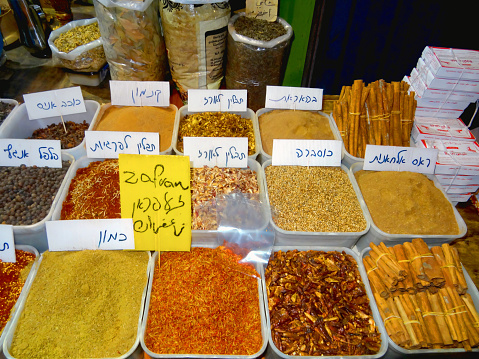 Various seasonings and spices are sold at an oriental bazaar. Mahaneh Yehudah Jerusalem, Israel - September 10, 2023