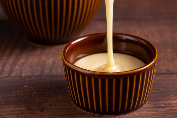 istock Fresh condensed milk in the bowl. 1917705752