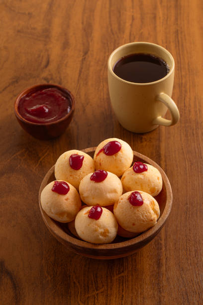 Cheese breads with guava cream on breakfast table.