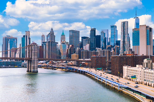 Aerial of  Manhattan skyline and Brooklyn bridge New York City US