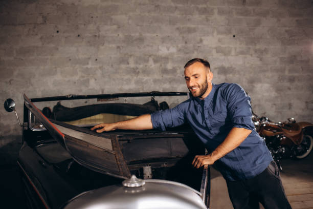 istock A man repairs a retro car in the garage 1917751154