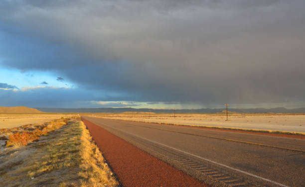 istock Roads during a red sunset and thunderclouds against the backdrop of the Guadalupe Mountains in New Mexico 1917761184