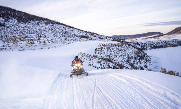 istock Driving a snowmobile in Colorado, USA 1917770675