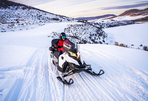 Driving a snowmobile in Colorado, USA
