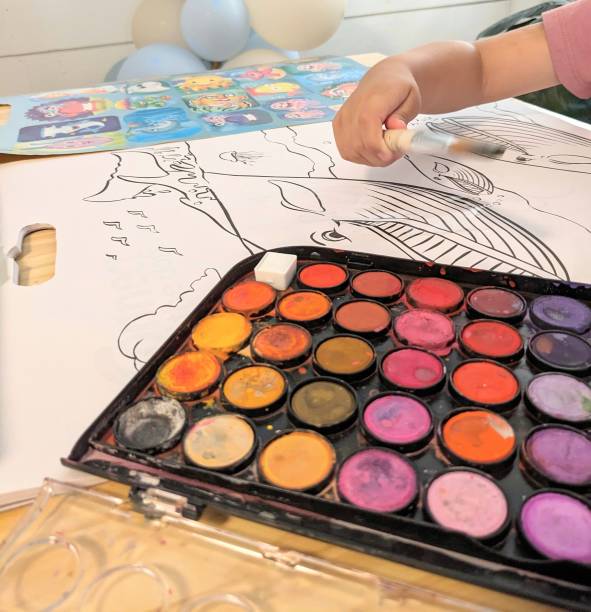 istock Child Painting with Watercolors 1917778705