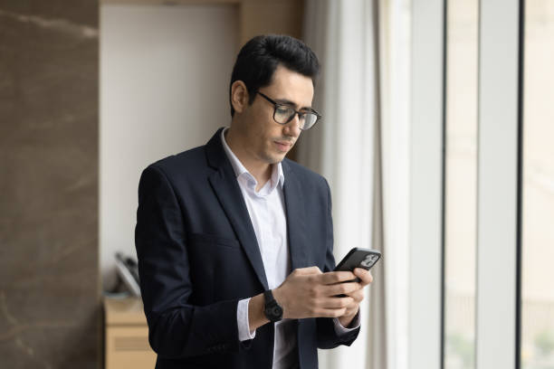 istock Serious young Arab business professional man using job application 1917784546