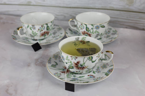 istock Brewing green tea in a bag in a cup 1917791697