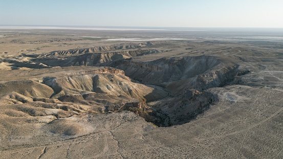 An aerial view of a barren desert landscape in Kazakhstan