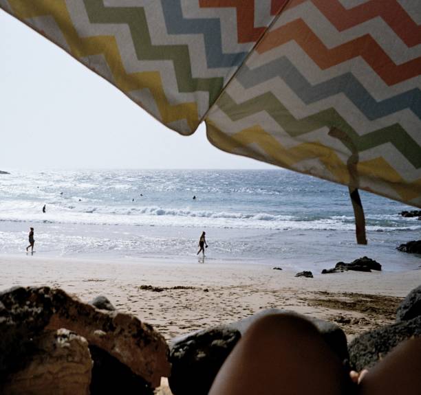 Under the shade on the beach