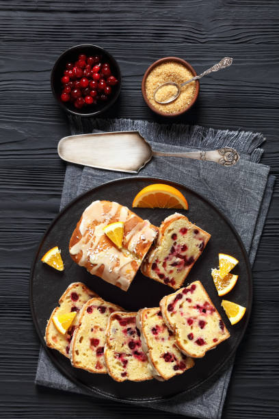 istock orange cranberry loaf with orange glaze, top view 1917829862