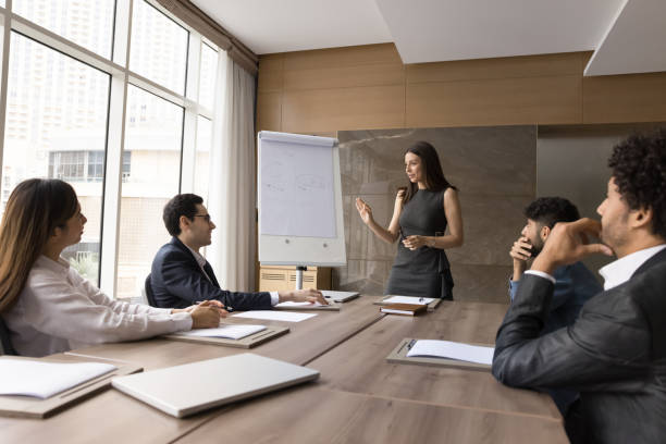 istock Diverse business team and project leader woman discussing work strategy 1917851425