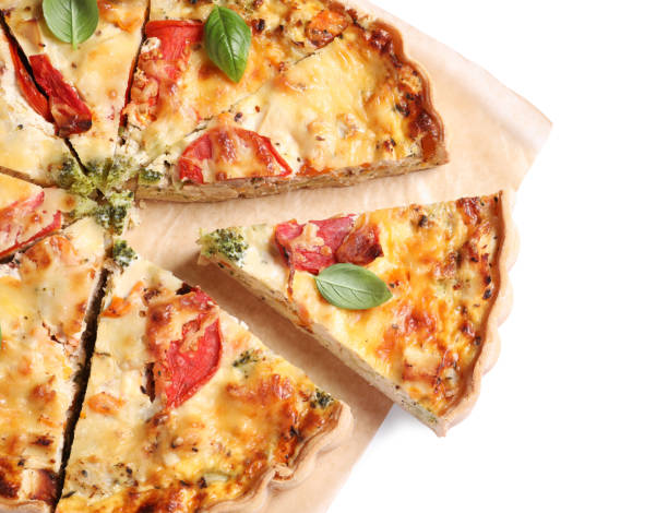 istock Tasty quiche with tomatoes, basil and cheese on white background, above view. Space for text 1917922293