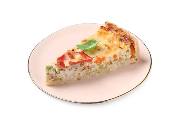 istock Tasty quiche with chicken, cheese, basil and vegetables isolated on white 1917923093