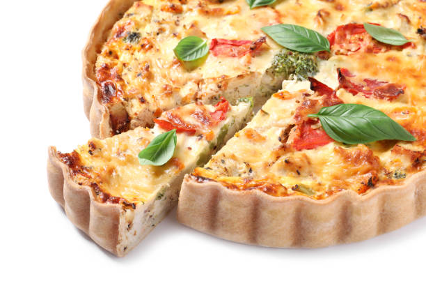 istock Tasty quiche with tomatoes, basil and cheese isolated on white 1917923341