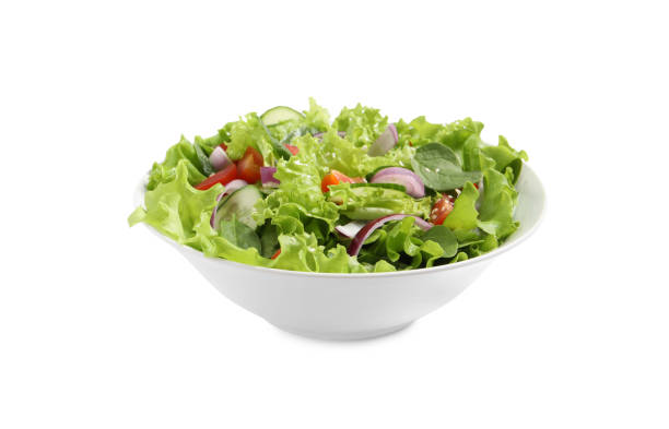 istock Delicious salad in bowl isolated on white 1917933133
