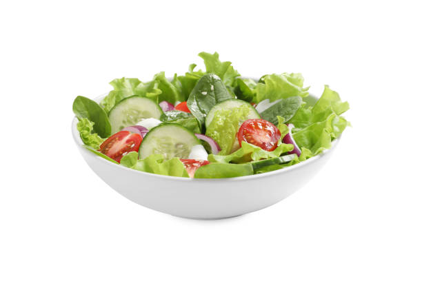 istock Delicious salad in bowl isolated on white 1917933649
