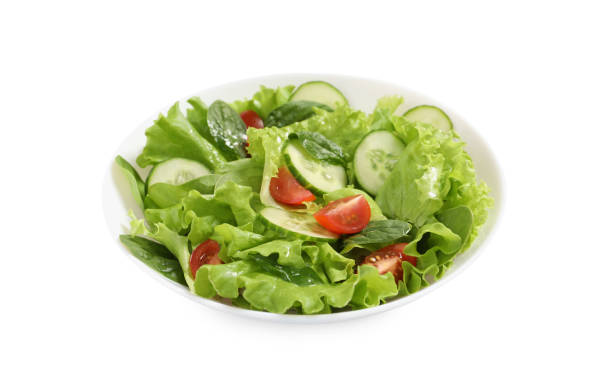 istock Delicious salad in bowl isolated on white 1917934169