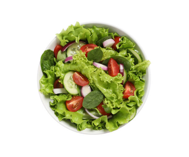 istock Delicious salad in bowl isolated on white, top view 1917934177