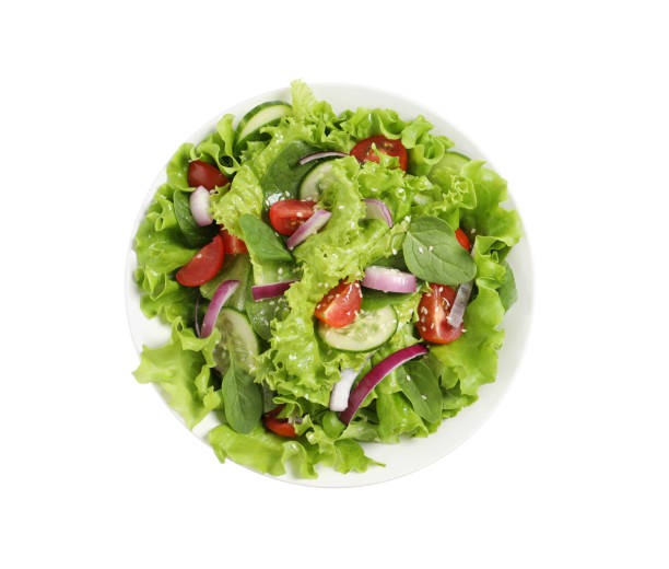 istock Delicious salad in bowl isolated on white, top view 1917934700