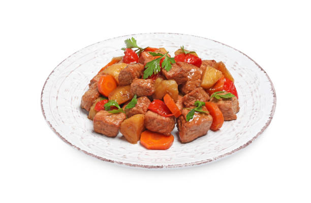 istock Plate with delicious goulash isolated on white 1917950755