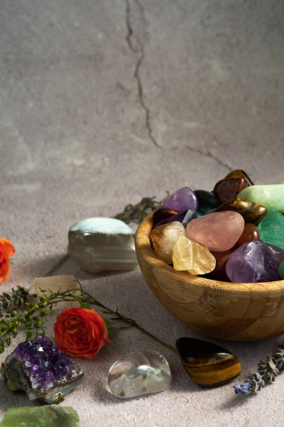 istock various gem stones in a wooden bowl 1917983634