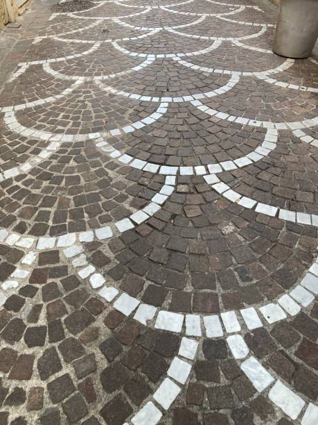 istock Cobblestone street with curves and squares 1917985715