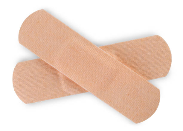 istock Medical adhesive bandages isolated on white, top view 1918015161
