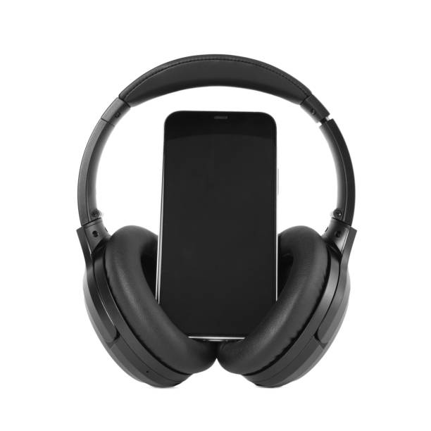 istock Modern wireless headphones and smartphone isolated on white 1918025573
